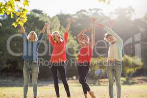 Group of friends having fun in park