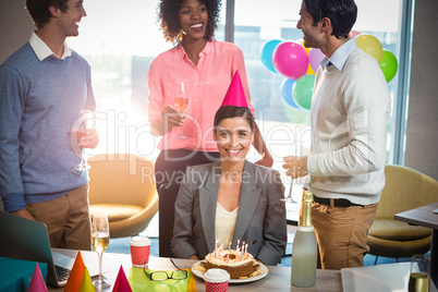 Business people celebrating birthday