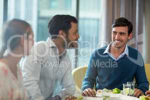 Business people having breakfast