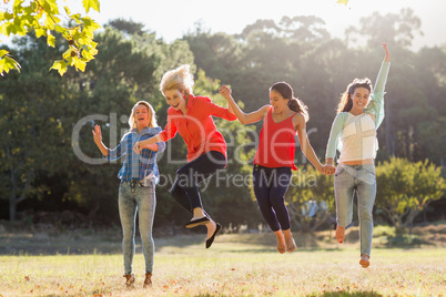 Group of friends having fun in park