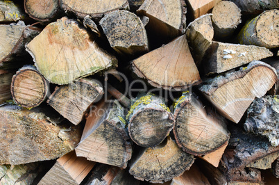 Natural wooden background - closeup of chopped firewood