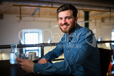 Man holding on mobile phone