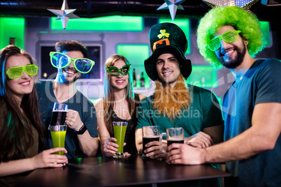 Group of friends standing and smiling