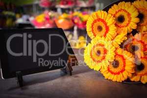 Digital tablet with yellow sunflower