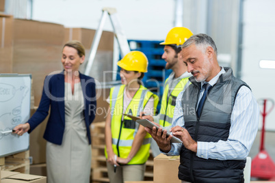 Warehouse team having a meeting