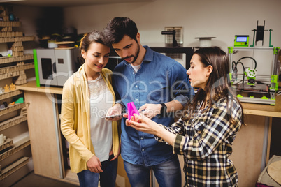 Team of graphic designers interacting using digital tablet