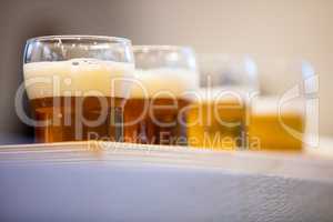 Close-up of beer glasses