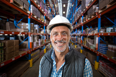 Portrait of happy worker smiling to the camera