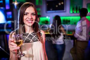 Beautiful woman toasting a glass of wine