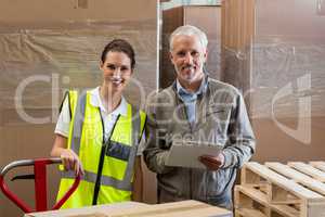 Portrait of manager and worker are smiling and posing