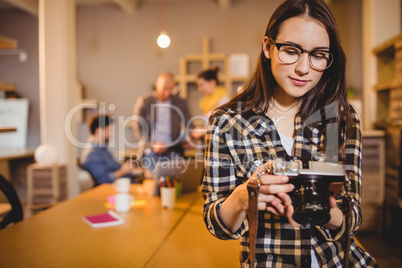 Graphic designer checking pictures in camera