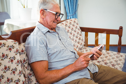 Senior man using a smartphone