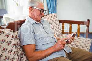 Senior man using a smartphone