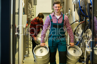 Brewer carrying keg