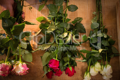 Flowers on the wooden worktop at flower shop