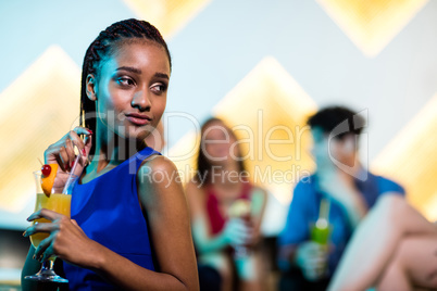 Beautiful woman having a cocktail