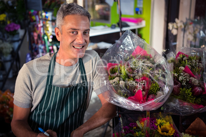 Portrait of male florist