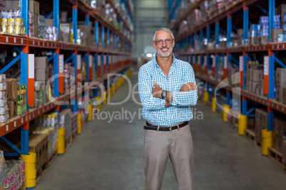 Smiling men in warehouse
