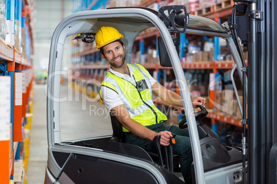 Portrait of worker is smiling and posing during work