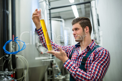 Brewer testing beer