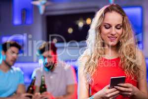 Beautiful woman using mobile phone