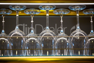 Wine glass arranged in bar rack