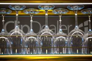 Wine glass arranged in bar rack