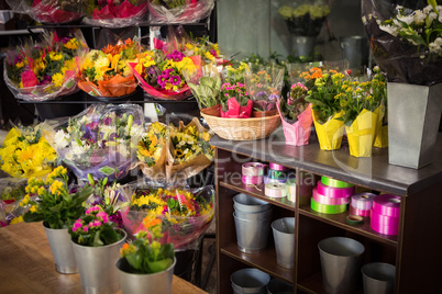 Flower vase arranged on a wooden worktop