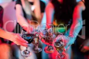 Group of friends toasting glass of champagne