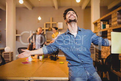 Graphic designer holding file