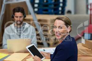 Smiling worker looking at camera