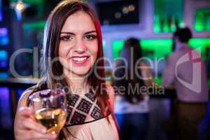 Beautiful woman holding a glass of wine