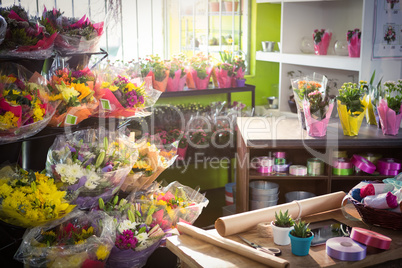 Bouquet of flower and gift wrapping items