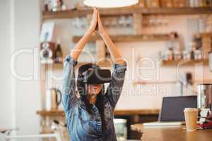 Young woman using the virtual reality headset