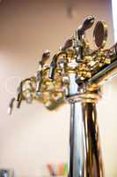 Close-Up of beer pump in a row