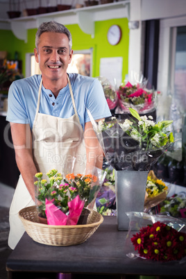 Portrait of happy male florist