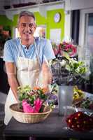 Portrait of happy male florist