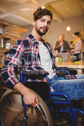 Graphic designer sitting on a wheel chair