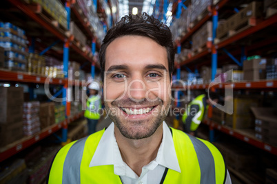 Close-up of smiling worker