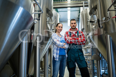 Brewers standing at brewery