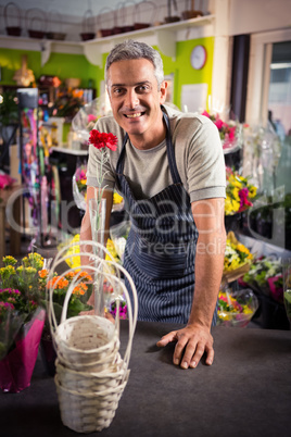 Portrait of happy male florist