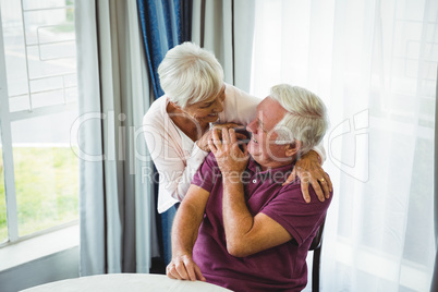 Senior couple hugging each other