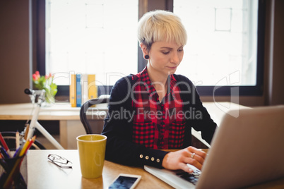 Young woman using laptop