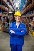 Female worker standing in front of camera