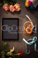 Digital tablet and florist accessories on the table