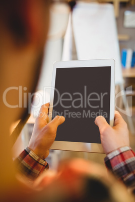 Graphic designer using digital tablet