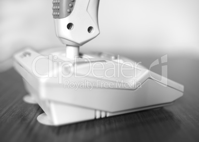 Black and white retro arcade joystick bokeh background