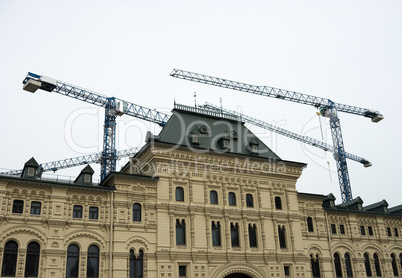 Rebuilding of state department store on Red Square in Moscow bac