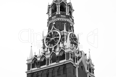 Black and white Moscow Kremlin tower with clocks closeup background