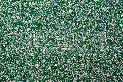 Horizontal vivid green blue pebble grainy sand textured abstract